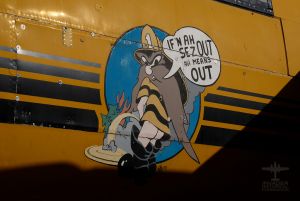 Showing a close-up of the nose art on 44-35875 as C-FPGF in the service of Air Spray, Ltd.